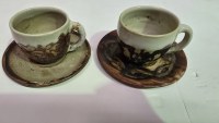 Lot 36. LUCY BOYD BECK CUPS WITH SAUCERS